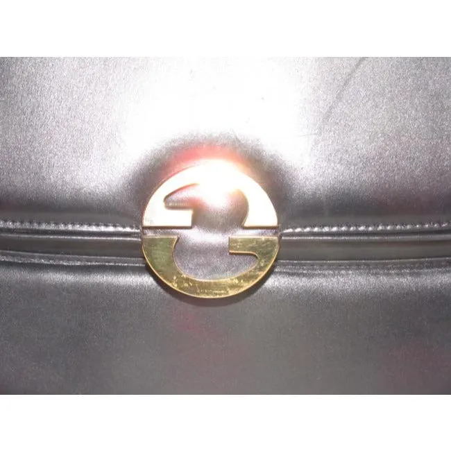 Vintage, RARE, Gucci, mod, deep blue leather, 1973 line , shoulder purse with bold gold tone accents